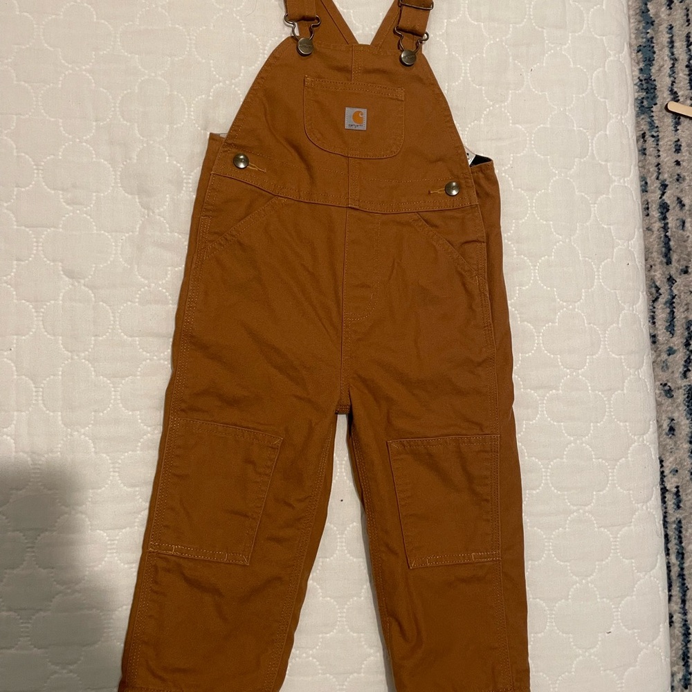Brand new Carhartt 2T overall. Tan color, never worn. Smoke and pet free home.
